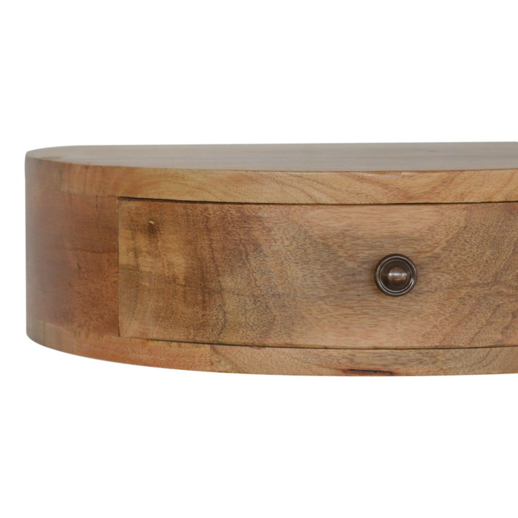 Curved chestnut floating bedside wall-mounted in compact bedroom