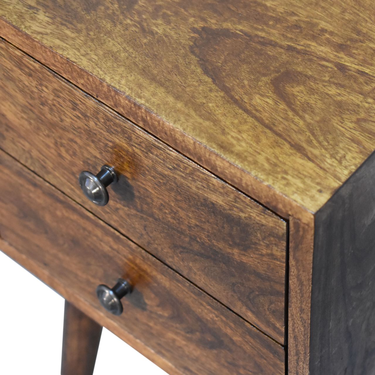 Mini chestnut bedside table in compact bedroom interior