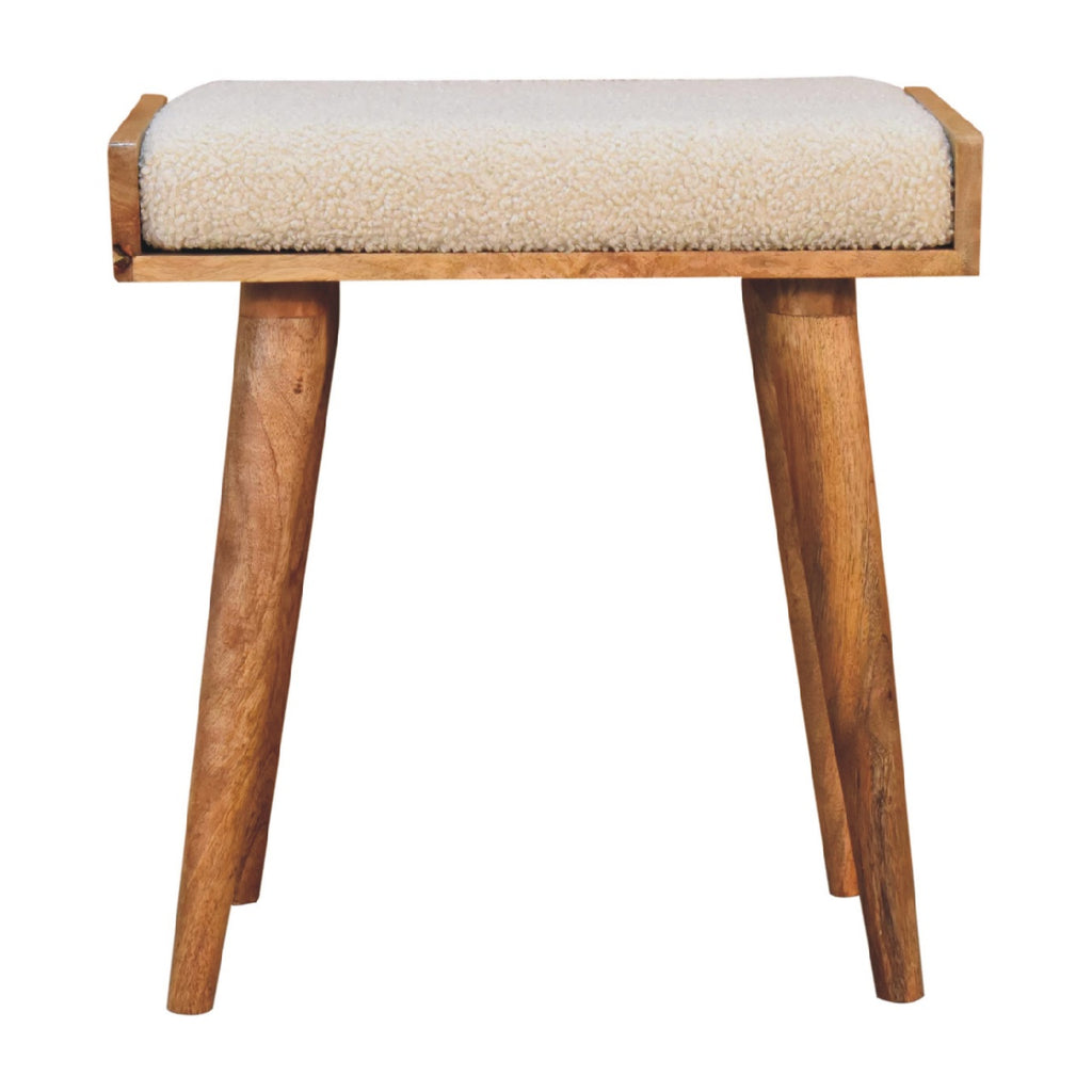 Atelier cream stool side view showing tapered Nordic legs