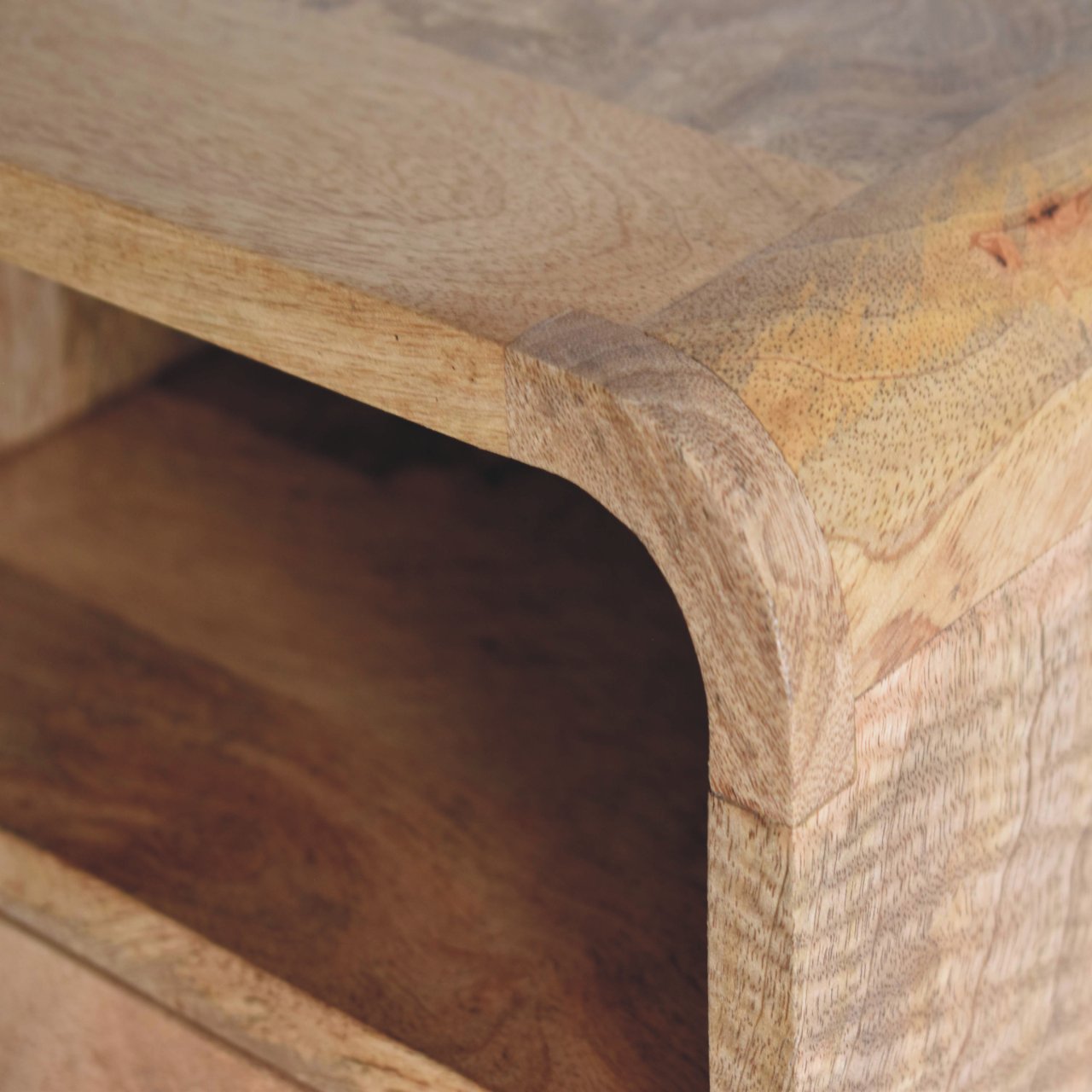 Curved oak floating bedside angled view showing open shelf