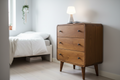 Mini Nova 3-drawer chestnut chest solid mango wood with brass knobs and Nordic legs – front view